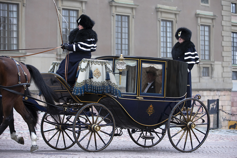 Uzbekistan's ambassador and his retinue arrive at the Royal Palace in the Royal Stables' carriages. 